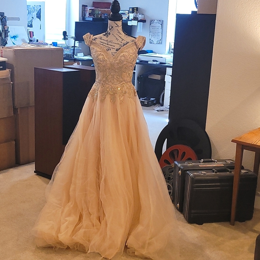 A peachish rose gold dress, size 6.